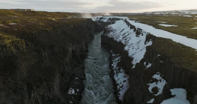 Tall Cliffs of Hvita River Canyon in Southwest Iceland - Aerial Flight