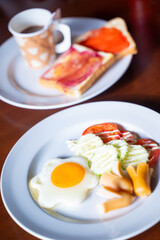 fried egg with sausage for breakfast