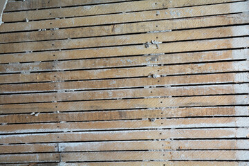 Plaster and lath walls that make great construction and grunge texture for backgrounds or old house...