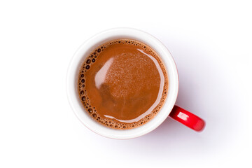 Hot chocolate or cocoa drink in red ceramic mug isolated on white. Top view. Flat lay,