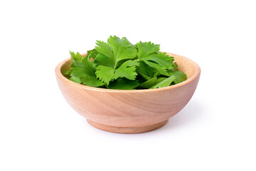 celery leaf in wooden bowl
