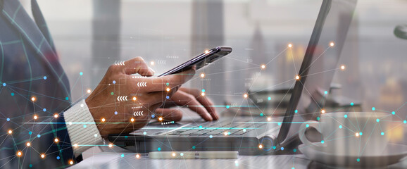 internet network connection digital big data technology with man using smartphone and laptop and city background
