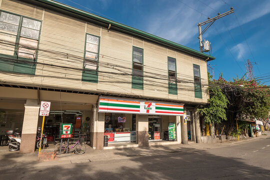 Cebu City, Philippines - May 2022: A 711 store in the ground floor of an old restored building in the Parian District.