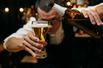 Barman pouring whiskey whiskey glass beautiful night