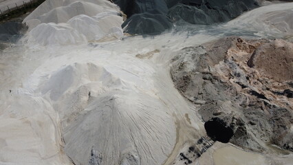 An aerial view of the piles of fine stone in the quarry. Fine stone is used in the production of quality asphalt for roads and for the preparation of concrete used in construction