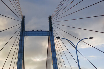 Obraz premium Cables of Vidyasagar Setu (Bridge) over river Ganges, with dramatic sky - known as 2nd Hooghly Bridge in West Bengal, India. Connects Howrah and Kolkata, Longest Cable - stayed bridge in India.