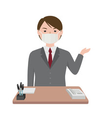 マスクを着けて受付業務をしている女性社員
