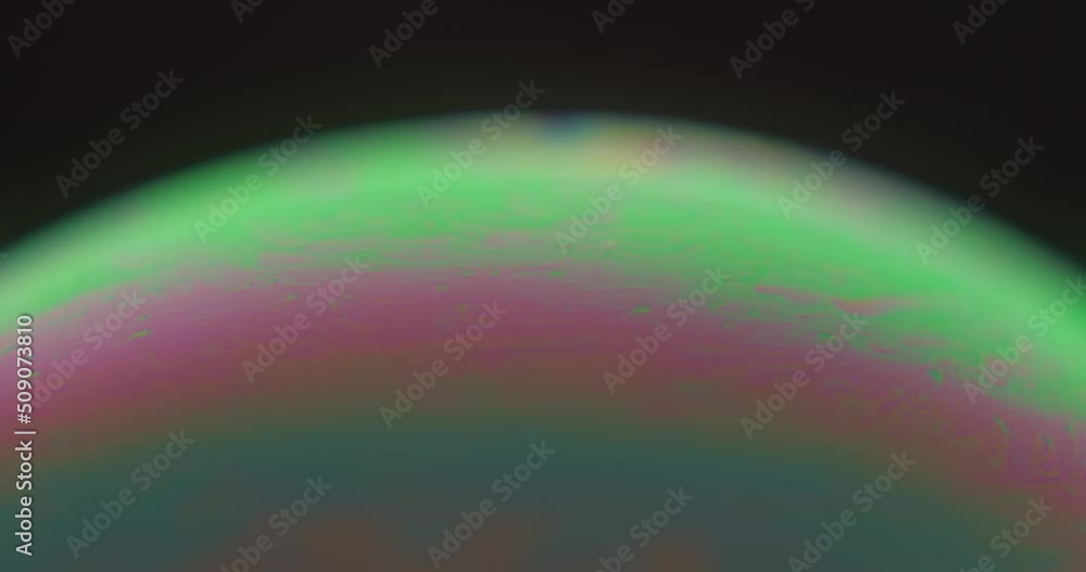 Poster macroscopic view of soap bubble showing colorful and bright layers. close up.