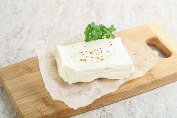 Greek Feta cheese over board