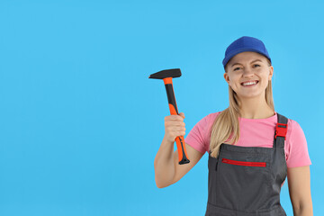 Concept of occupation, young woman on blue background