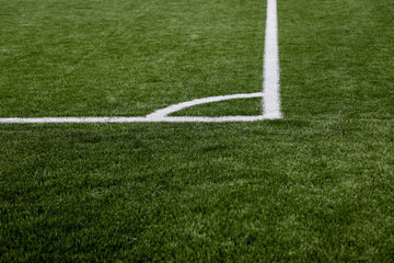 Obraz premium artificial green grass soccer field.