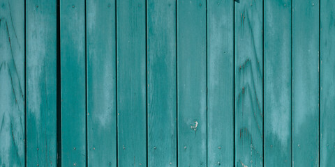 green wooden background with old painted boards in header web panoramic