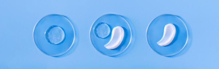 banner smear of cream round transparent drop of banner transparent gel serum in a petri dish on a blue background	
