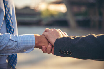 Fototapeta premium Lawyer partnership Businessman handshake together Notary lawfirm. Two Men Trust honesty business customer handshake promise respect partner. Diversity solidarity team Partner hands together teamwork