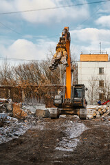 Excavator with hydraulic scissors