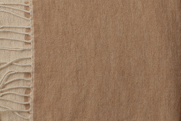 Knitted fabric wool texture close up as a background. Abstract backdrop. selective focus