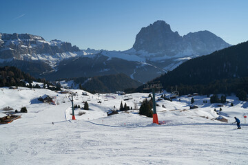 Ski slopes on Seceda in Val Gardena, Sassolungo mountain in background.