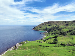 Aerial photo of Murlough Bay by the Atlantic Ocean on North Coast Antrim Northern Ireland