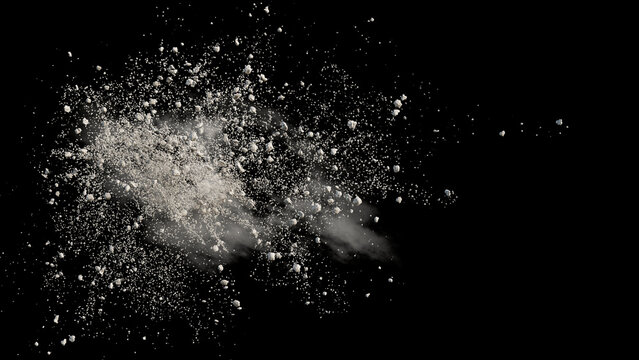 flying debris with dust on black background