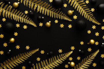 Golden decorative cane branches and snowflakes and Christmas balls on a black background, Merry Christmas and Happy New Year