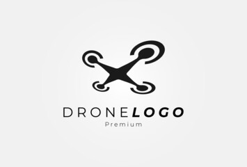 Drone logo,minimalist flying drone logo with perspective view from below, flat design logo template, vector illustration