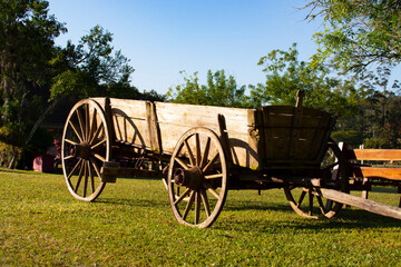 Fototapeta na wymiar An old wooden cart on a fazenda in Brazil. Wooden cart