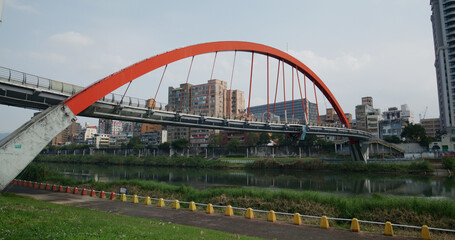 Fototapeta na wymiar Rainbow Bridge across the Keelung River