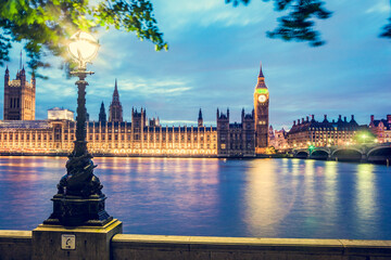 Big Ben, Westminster Bridge on River Thames in London, England, UK at night