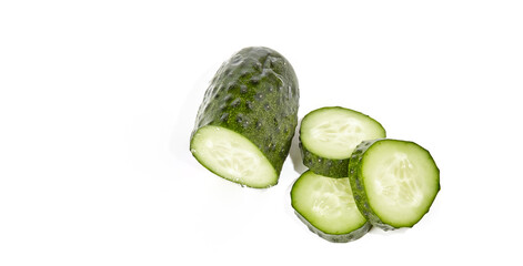 Cucumber and slices isolated over white background. Healthy chopped vegetables for salad