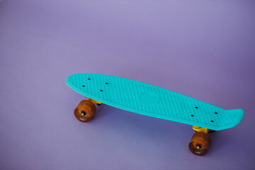 Skateboard isolated in studio on colorful background