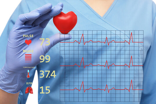 Closeup view of doctor holding red heart and illustration of cardiological diagnostic app interface