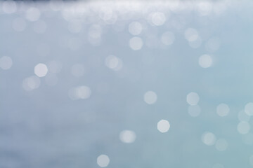Blurred view of seascape on sunny day, bokeh effect