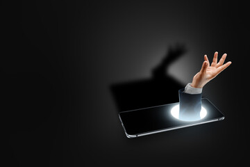 A man's hand sticks out of a smartphone, asks for help. Smartphone addiction concept, 21st century disease, social media. copy space. Copy space, mixed media