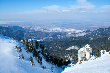 Wintertime landscape in the Piatra Mare mountains , part of the Carpathian range , Romania.