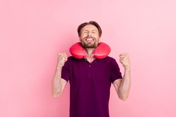 Photo of young cheerful guy fists hands rejoice luck triumph vacation isolated over pink color...