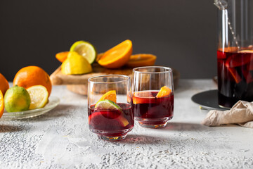 Refresh Spanish Sangria made with red wine and citrus fruit on cocnrete background .Summer drink