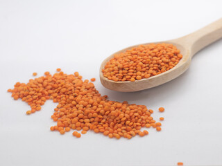 lentils in a wooden spoon