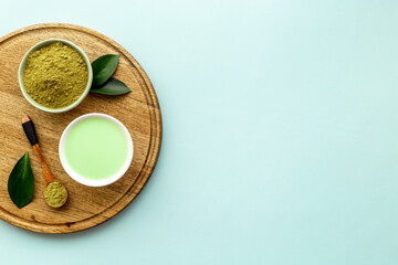 Tea ceremony with matcha powder and hot drink, top view