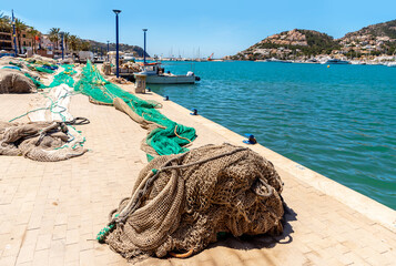 Fishing nets on the pier. Embankment in Port d’Andratx