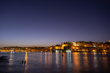 Valletta And Floriana Night Skyline In Malta