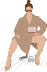 woman plus size girl in a beige raincoat in brown glasses in beige shoes with a small shoulder bag sits on a chair in a faceless style