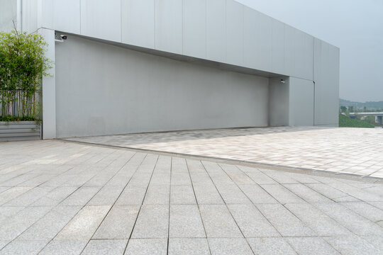 empty ground floor in front of modern architecture exterior.