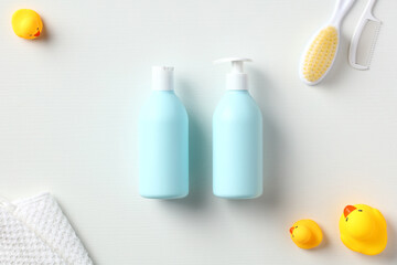 Newborn baby shampoo and body wash packaging design on white table. Flat lay, top view.