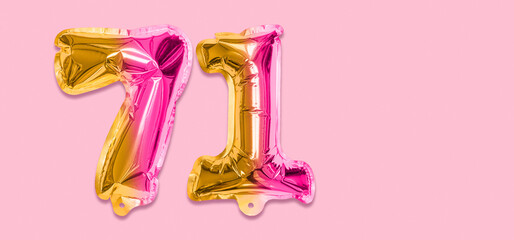 Rainbow foil balloon number, digit seventy one on a pink background. Birthday greeting card with inscription 71. Top view. Numerical digit. Celebration event, template. Banner