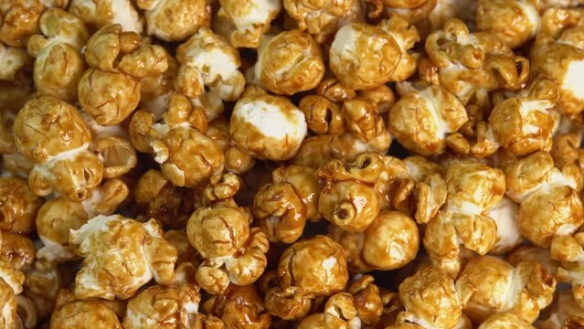 Coffee taste hot popcorn with smoke rotating close up. Caramel popcorn. Healthy food for morning breakfast. Healthy breakfast concept. High quality 4k footage