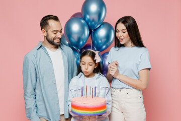 Young parents mom dad with child kid daughter teen girl in blue clothes celebrate birthday holiday...
