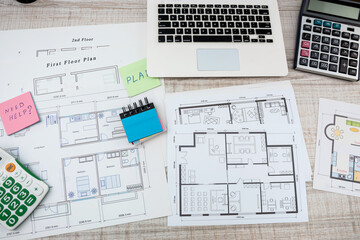 Fototapeta premium designers work as a team on drawings and designs of new house projects.