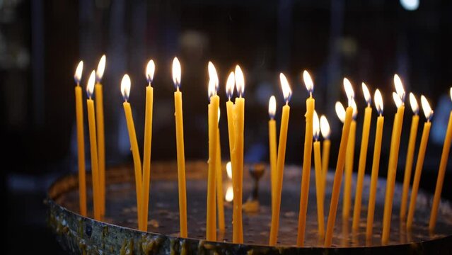 Candles are burning in the church