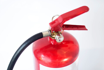 Fire extinguisher used to put out fires during an emergency, on an isolated white background, close-up