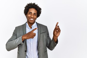 Young african american man wearing business jacket over isolated white background smiling and...